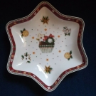 Weihnachtsteller von Villeroy & Boch, 24,5 cm x 4,5 cm in Sternform.